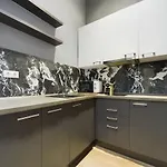 Cosy Gray Apartment In Heart Of City